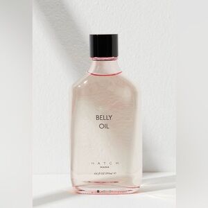 Pale Pink Belly Oil Moisturizer in Clear Glass Bottle